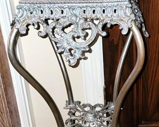 Silver ornate pedestal