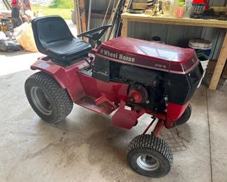 Wheelhorse lawn tractor with mower deck and tiller attachment available