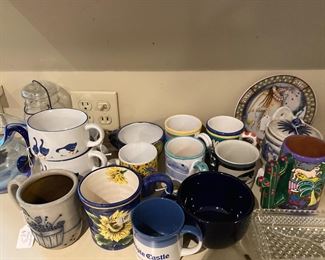 Pottery mugs and soup bowls. 