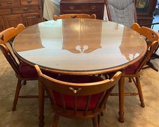 Tell City table and chairs 47" Round 30" high with 2 leaves