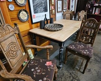 FOUR CHAIRS/ONE IS DIFFERENT