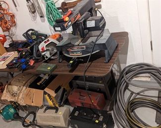 Saw, hoses, tool boxes