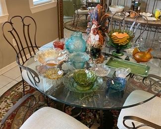 Iron and glass table with 4 chairs.