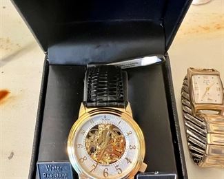 Croton watch still in case. 