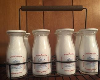 A late 1990s commemorative milk bottle set from Starr Commonwealth. 