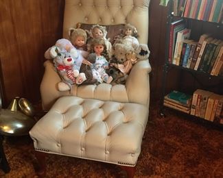 This Queen Anne chair with matching ottoman features tacks to add definition. 