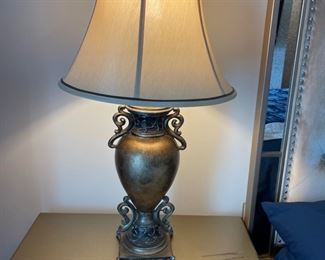 Table lamps with silver metal finish ceramic base and off white fabric shade