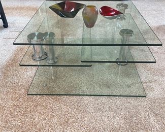Glass Coffee Table with adjustable side that swivel to expand. super cool ! 