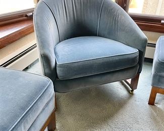 Rolling blue velvet mid century armchair and two foot stools 