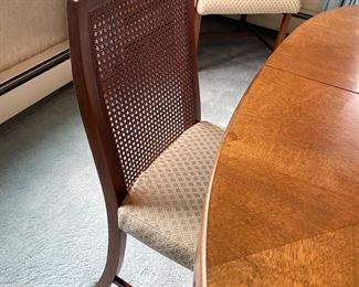 Mid Century dining table and caned back chairs (with extra leaves and pad)
