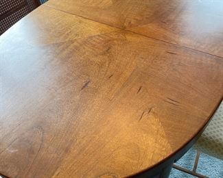 Mid Century dining table and caned back chairs (with extra leaves and pad)