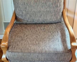 Check out the elegant carved arms and legs on this oversized chair!