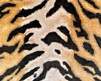 Amazing Tiger Settee with Wood Carving. This is a Conversation piece that will be treasured for many years!