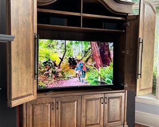 Extra large TV cabinet 6'3"  wide x 8'8" tall.  This cabinet will need a professional mover (one piece) 
* TV is not for sale 
