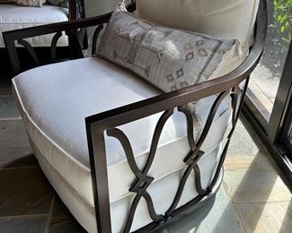 swivel arm chair by Tommy Bahama