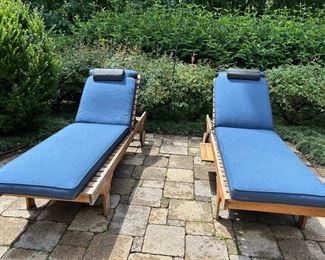 2 teak lounge chairs with cushions
