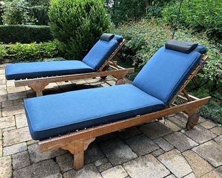 2 teak lounge chairs with cushions