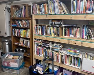Joy dedicated turning her garage into a library for kids K-12. Truly ranges, most teen books are on the top shelves. Several in Spanish as well. I personally opened several boxes shipped directly from Scholastic of new books.
