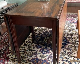Beautiful drop leaf table with padding for top