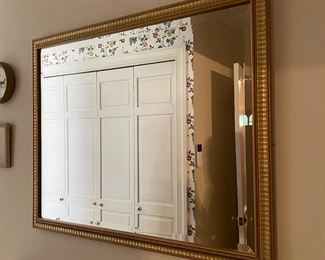 W1 - $25. Gold Framed mirror. Measures 30.5" x 24.5". 