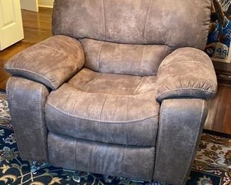 F20 - $200 Oversized Glider Recliner. Measures 45" wide x 40" deep. 