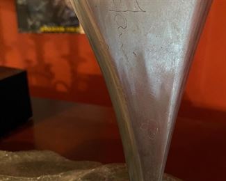 D80 - $500. Stainless Sculpture mounted on stone. Signed. 