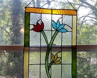 W9 - $45. Flower stained glass. Measures 13.5" x 19.5" tall