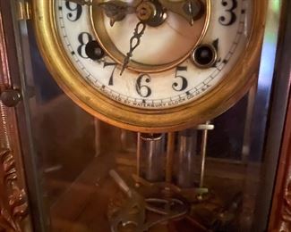 D4 $275. Waterbury Mantle Clock. 4 sided glass case. Measures 8.5" square at base x 13.5" tall. Beautiful statement piece!