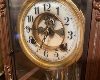 D4 $275. Waterbury Mantle Clock. 4 sided glass case. Measures 8.5" square at base x 13.5" tall. Beautiful statement piece!