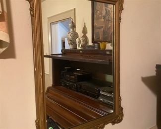 W15 - $15 vintage mirror has parts of the frame chipping. Measures 23" x 33.5". 