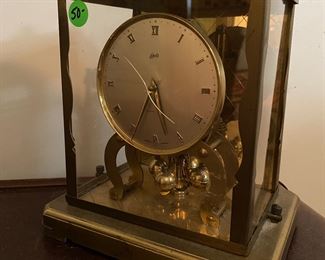 D18 - Schatz mantle clock. Plexiglass case is cracked.