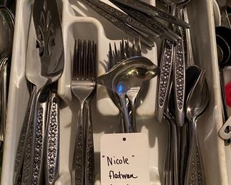 K8 - $75 "Nicole" floral flatware. 