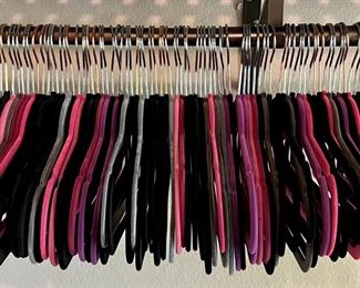 Lot Of Black, Pink, And Purple Velvet Hangers