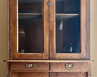 Antique Oak Break Front Cabinet With Brass Pulls And Locks
