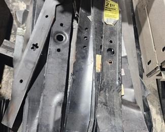 Large assorted of Lawn mower blades multiple manufacturers such as Toro, MTD, Primeline