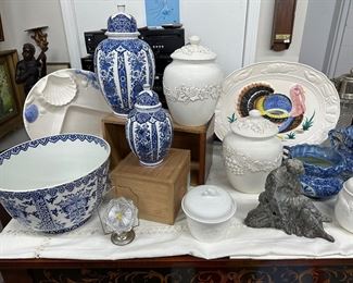 blue and white ginger jars and large bowl, bronze sculpture