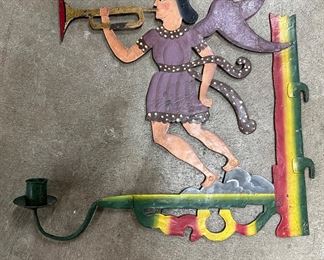 1800’s metal cut out craftsman sign with candle light. 