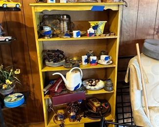 Great vintage painted bookcase with bottom storage.  Arthur Court items.