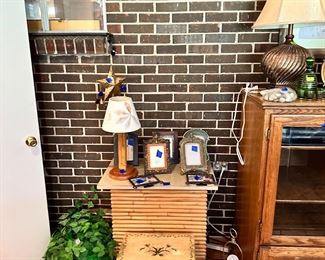 Unusual bamboo bar,  lots of photo frames, more greenry and wind chimes