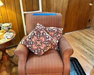 Lazy Boy recliner, beautiful throw pillows.  Decorative ladder for throws, blankets, etc.