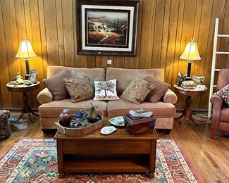 Custom made sofa with extra set of seat cushions.  Pair of great round side tables.  Beautiful rug, coffee and decor items.