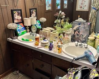 Lots of bathroom items, more rugs, travel bags and decor items.