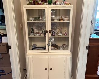 Small china cabinet.  Shelves with plate grooves.  Lots of uses seems to be art deco in style.  Rare antique needlework with original frame