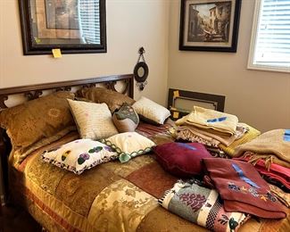 Lots of bedding, throws, accent pillows