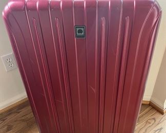 Delsey Red Hard Back Suitcase