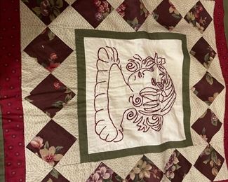 Assortment of Quilts and Embroidered Linens
