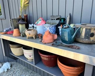 Assortment of Planters, Garden Decor, and Garden Tools