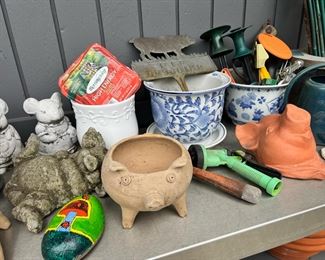 Assortment of Outdoor Decor and Planters
