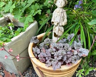 Assortment of Outdoor Decor and Planters