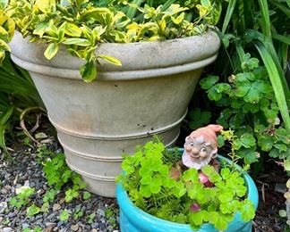 Assortment of Outdoor Decor and Planters